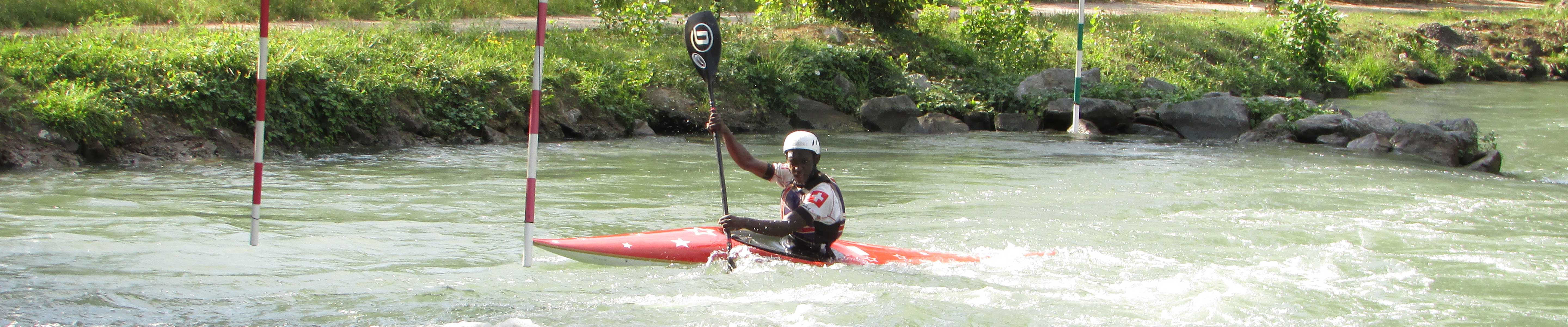 Vawn Humphrey-Wilson in his kayak in whitewater